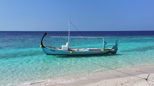 Aerial view of a traditional dhoni boat in Kendhoo Maldives. Aerial view of a traditional dhoni boat in Kendhoo Maldives.