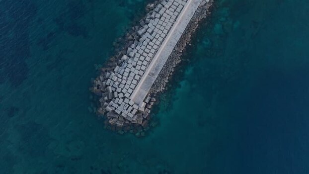Aerial view of the breakwater at Island of Ortigia Italy. Aerial view of the breakwater at Island of Ortigia Italy.