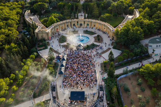 Attard Northern Region Malta 20 September 2026 Aerial view of a large crowd at an outdoor concert in Park Nazzjonali Ta Qali featuring a central fountain and lush greenery. Attard Northern Region Malta 20 September 2026 Aerial view of a large crowd at an outdoor concert in Park Nazzjonali Ta Qali featuring a central fountain and lush greenery.