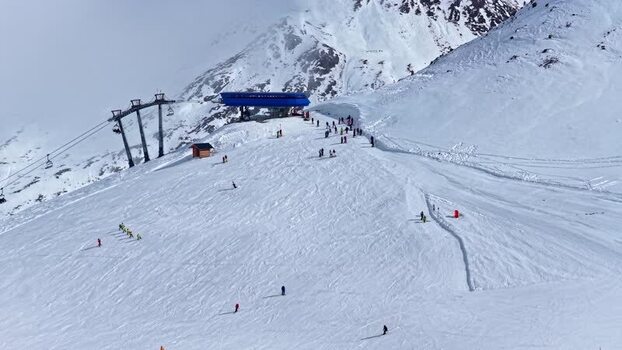Aerial view of skiers on a snowy slope in Nauders Austria.