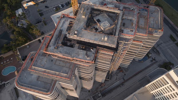 Aerial view of a high rise building under construction in Miami Beach Florida United States. Aerial view of a high rise building under construction in Miami Beach Florida United States.