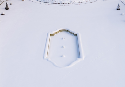 Aerial view of the snow covered fountain and minimalist garden at Traku Voke Manor in winter Vilnius Vilniaus apskritis Lithuania.