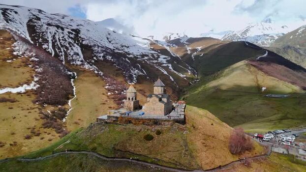 Aerial view of Gergeti Trinity Church in the mountains Georgia.