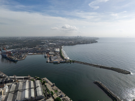 Aerial view of the industrial port and coastal facilities in Bajos de Haina San Cristobal Provinc Dominican Republic.