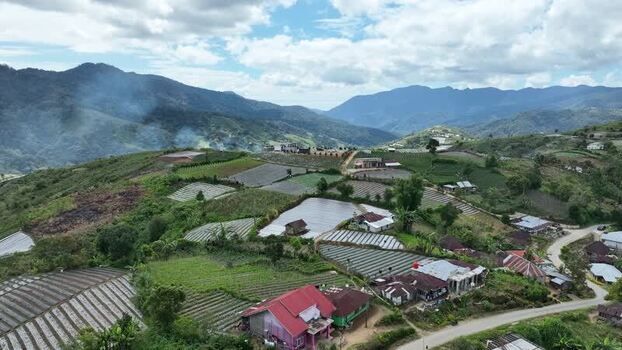 Aerial view of Alahan Panjang village and terraced fields Indonesia. Aerial view of Alahan Panjang village and terraced fields Indonesia.