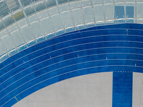 Berlin Germany 26 September 2026 Aerial view of the blue running track at the Olympiastadion Berlin with its distinctive glass roof structure.