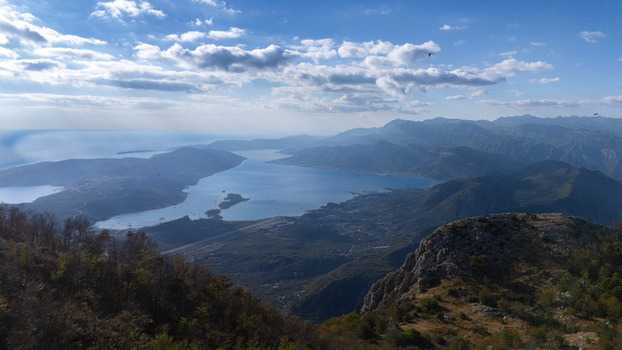 Aerial view of the Bay of Kotor with surrounding mountains and the coastline of Tivat Tivat Municipality Montenegro. Aerial view of the Bay of Kotor with surrounding mountains and the coastline of Tivat Tivat Municipality Montenegro.
