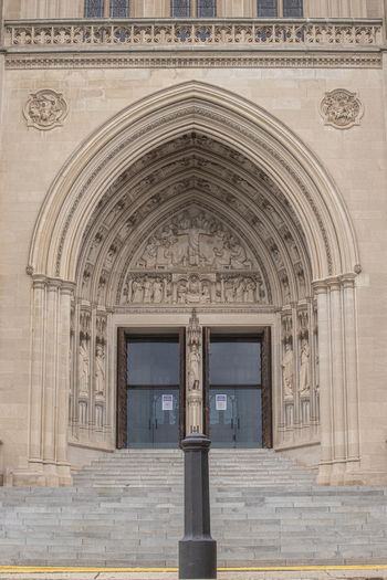 Washington United States 06 May 2025 View of the Washington National Cathedral featuring its intricate Gothic stone carvings arched entrance and grand staircase.