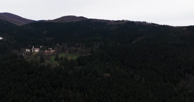 Aerial view of Vallombrosa Abbey nestled in dense forest Italy. Aerial view of Vallombrosa Abbey nestled in dense forest Italy.