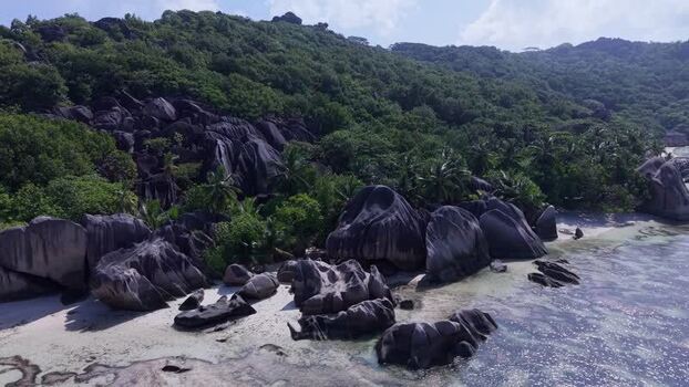 Aerial view of Anse Reunion granite boulders Seychelles.