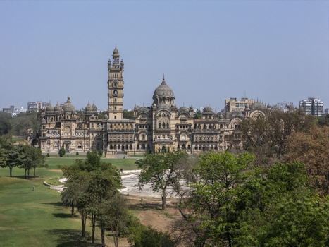Vadodara India 14 March 2026 Aerial view of Laxmi Vilas Palace featuring its ornate Indo Saracenic architecture tall central tower and lush green gardens under a clear sky. Vadodara India 14 March 2026 Aerial view of Laxmi Vilas Palace featuring its ornate Indo Saracenic architecture tall central tower and lush green gardens under a clear sky.