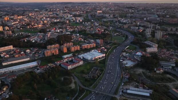 Aerial view of city and highway traffic Portugal.