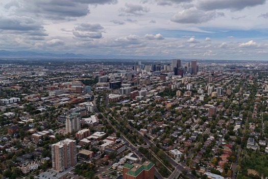Aerial view of Cherry Creek winding through the urban landscape of Denver Colorado United States. Aerial view of Cherry Creek winding through the urban landscape of Denver Colorado United States.