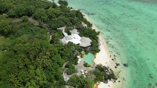 Aerial view of a tropical resort on the beach Cook Islands. Aerial view of a tropical resort on the beach Cook Islands.