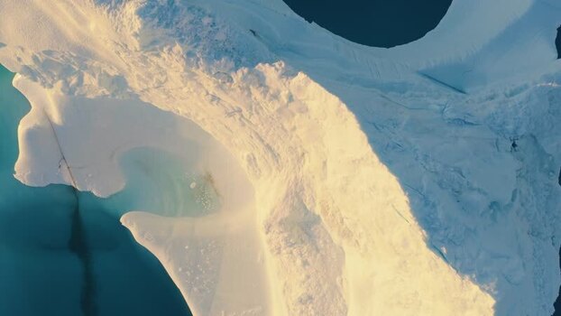 Aerial view of iceberg in the ocean Greenland. Aerial view of iceberg in the ocean Greenland.