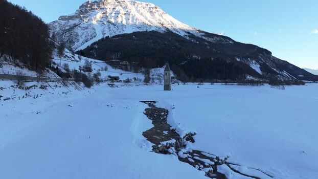 Aerial view of the Reschensee bell tower in Italy. Aerial view of the Reschensee bell tower in Italy.