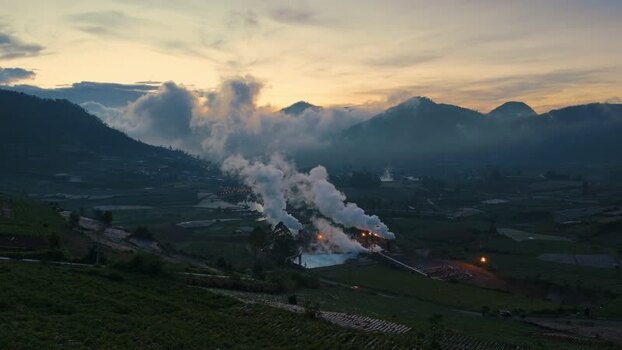 Aerial view of steam rising from Dieng geothermal plant Indonesia.
