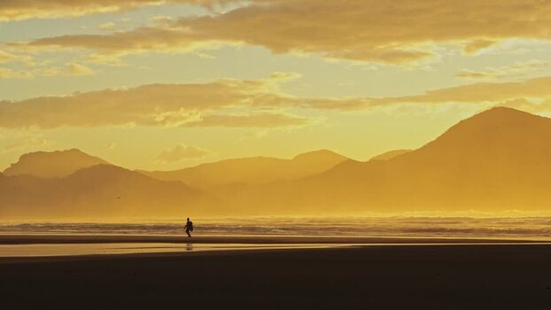 View of Wharariki Beach and mountains New Zealand. View of Wharariki Beach and mountains New Zealand.