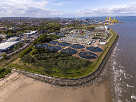 Edinburgh United Kingdom 06 May 2026 Aerial view of Seafield Wastewater Treatment Works featuring circular settling tanks along the coastline under a bright sky. Edinburgh United Kingdom 06 May 2026 Aerial view of Seafield Wastewater Treatment Works featuring circular settling tanks along the coastline under a bright sky.