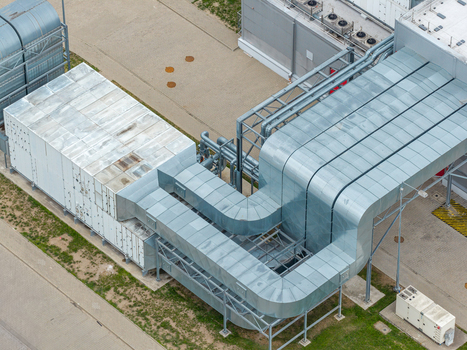 Aerial view of a large industrial ventilation system with complex metal ductwork in Poland. Aerial view of a large industrial ventilation system with complex metal ductwork in Poland.
