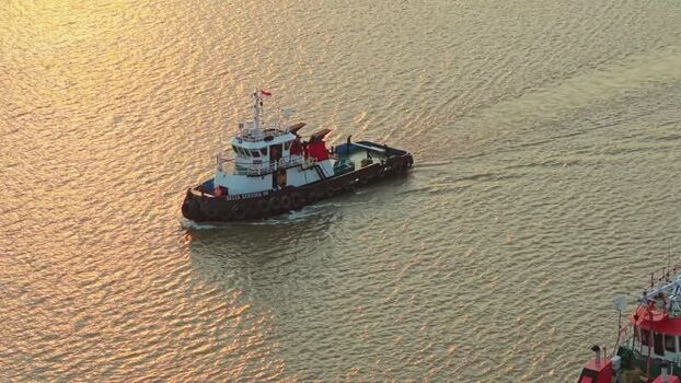 Aerial view of a tugboat on the Mahakam River Indonesia. Aerial view of a tugboat on the Mahakam River Indonesia.