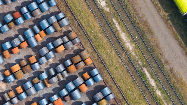 Aerial view of Tata Steel plant with large steel coils stacked near railway tracks under bright daylight Velsen Noord Noord Holland Netherlands. Aerial view of Tata Steel plant with large steel coils stacked near railway tracks under bright daylight Velsen Noord Noord Holland Netherlands.