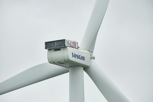 Esbjerg Denmark 24 July 2026 View of the Vestas wind turbine test center with its large white blades and nacelle against a cloudy sky.