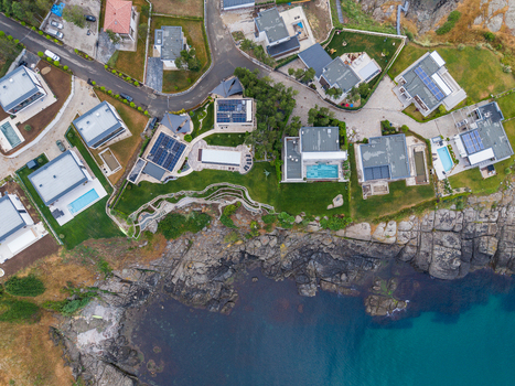 Aerial view of modern villas with swimming pools situated along the rocky coastline of Arapya in Burgas Bulgaria. Aerial view of modern villas with swimming pools situated along the rocky coastline of Arapya in Burgas Bulgaria.