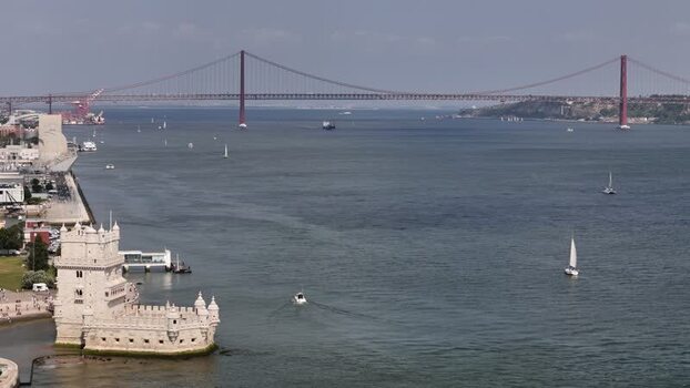 Aerial view of Belem Tower and Ponte 25 de Abril Portugal.