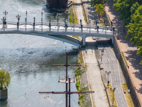 Aerial view of the Bridge of Arts with its iconic statues spanning the Vardar River featuring a ship like structure and pedestrian pathways Skopje Greater Skopje North Macedonia. Aerial view of the Bridge of Arts with its iconic statues spanning the Vardar River featuring a ship like structure and pedestrian pathways Skopje Greater Skopje North Macedonia.