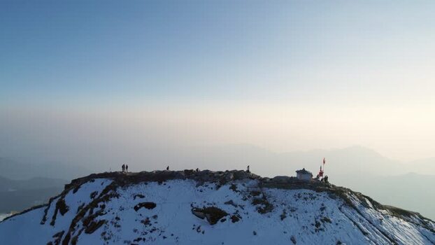 Aerial view of Shri Tungnath Temple on a snowy peak India.
