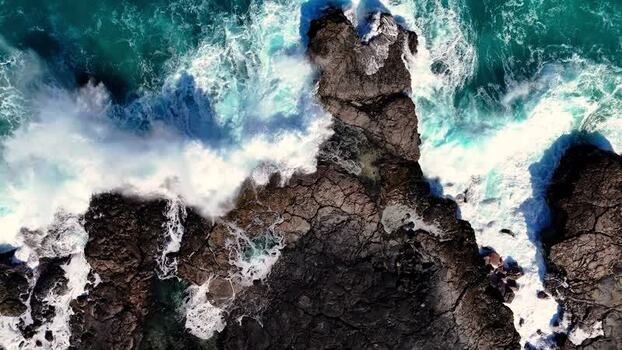 Aerial view of waves crashing on Kalaemamo cliffs United States.