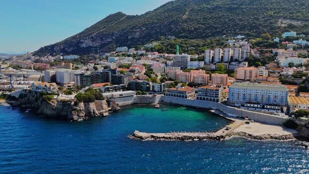 Aerial view of Rosia Bay and urban coastline in Gibraltar.