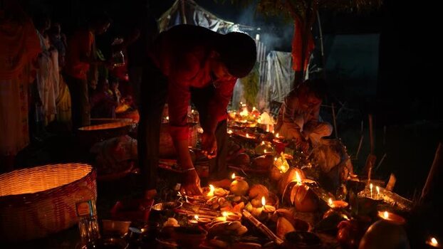 View of people lighting oil lamps at a festival Bangladesh. View of people lighting oil lamps at a festival Bangladesh.