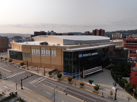 Pittsburgh United States 26 July 2026 Aerial view of PPG Paints Arena a multi purpose indoor arena in downtown Pittsburgh featuring its curved roof glass facade and urban streets.