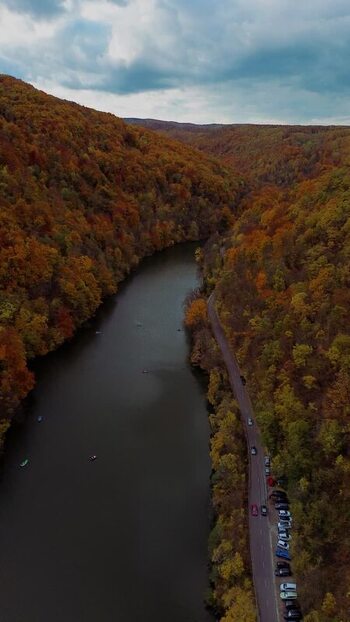 Aerial view of river and autumn forest in Miskolc Hungary. Aerial view of river and autumn forest in Miskolc Hungary.