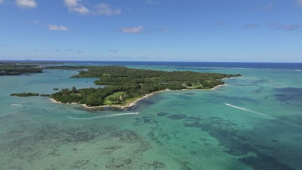 Aerial view of Ile aux Cerfs and turquoise lagoon Mauritius.