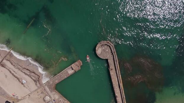 Aerial view of Charlestown harbour and coastline United Kingdom. Aerial view of Charlestown harbour and coastline United Kingdom.