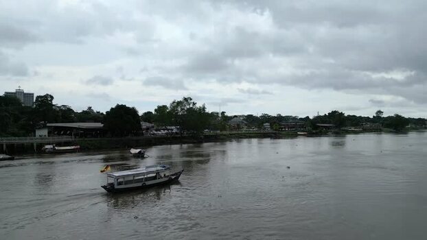Aerial view of Sarawak River in Kuching Malaysia. Aerial view of Sarawak River in Kuching Malaysia.