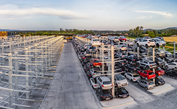 Livron sur Drome Auvergne Rhone Alpes France 20 June 2026 Aerial view of an automated car storage facility with multi level metal racks holding numerous parked vehicles. Livron sur Drome Auvergne Rhone Alpes France 20 June 2026 Aerial view of an automated car storage facility with multi level metal racks holding numerous parked vehicles.