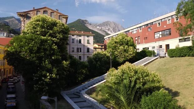 Aerial view of Carrara with marble mountains in the background Italy. Aerial view of Carrara with marble mountains in the background Italy.