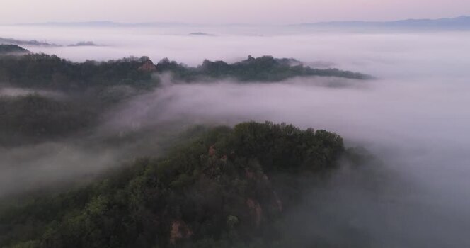 Aerial view of the Balze del Valdarno rock formations in fog Italy. Aerial view of the Balze del Valdarno rock formations in fog Italy.