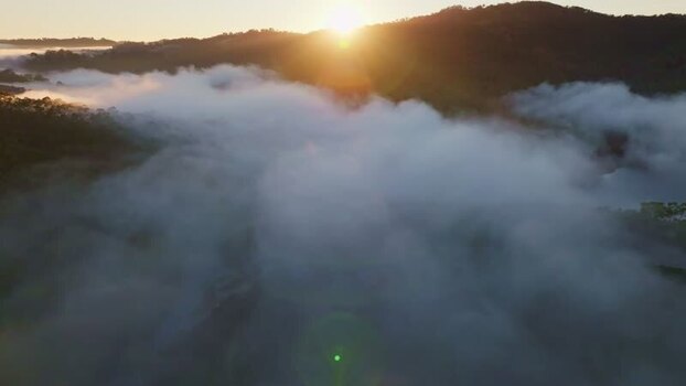 Aerial view of fog over Kangaroo Creek Reservoir at sunrise Australia. Aerial view of fog over Kangaroo Creek Reservoir at sunrise Australia.