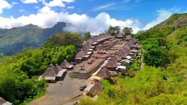 Aerial view of Bena Traditional Village and lush mountains Indonesia. Aerial view of Bena Traditional Village and lush mountains Indonesia.