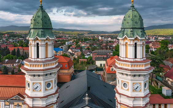 Aerial view of the grand spires of the Greek Catholic Cathedral rise against a backdrop of the city s rooftops Uzhhorod Zakarpattia Oblast Ukraine. Aerial view of the grand spires of the Greek Catholic Cathedral rise against a backdrop of the city s rooftops Uzhhorod Zakarpattia Oblast Ukraine.