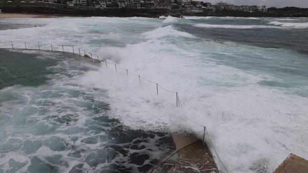 View of waves crashing into the Bondi Icebergs pool Australia.