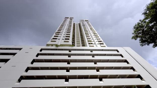 View of a tall residential building Singapore. View of a tall residential building Singapore.