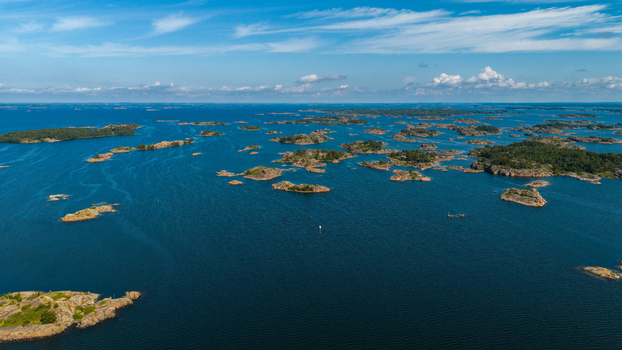 Aerial view of Oro Fortress Island surrounded by the scattered rocky islets and deep blue waters of the Archipelago Sea in Oro Varsinais Suomi Finland. Aerial view of Oro Fortress Island surrounded by the scattered rocky islets and deep blue waters of the Archipelago Sea in Oro Varsinais Suomi Finland.