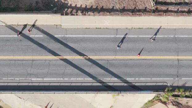 Aerial view of people walking on a road in Boulder United States. Aerial view of people walking on a road in Boulder United States.