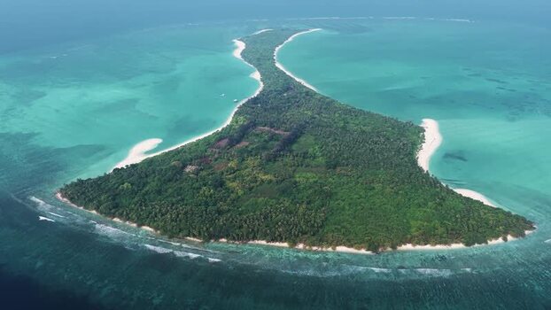 Aerial view of Vaikaradhoo island in the Maldives. Aerial view of Vaikaradhoo island in the Maldives.